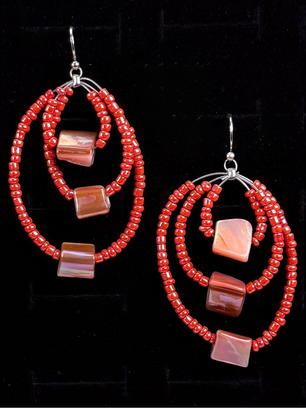 Bohemian Island chic Silvertone and coral color beaded pierced earrings